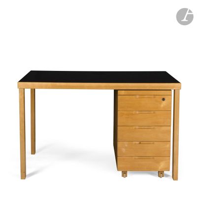 a wooden desk with drawers and a black top