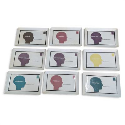 six business cards with different colored heads on them