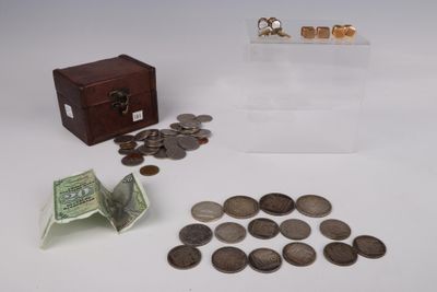 a small wooden box with coins and a small box with money