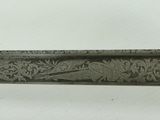 a knife that is being held up by a person