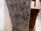 a large marble slab sitting on the floor in a room