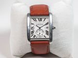 a close up of a wrist watch with roman numerals on it