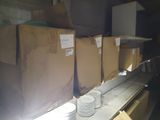 a lot of boxes that are stacked on a shelf