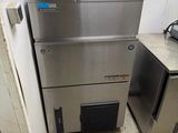 several stainless steel appliances are stacked on top of each other in a kitchen