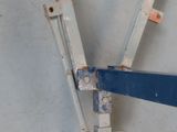 a close up of a pair of scissors on a piece of metal