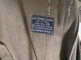 an image of a jacket with a label on the back of it