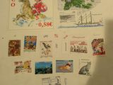 a picture of a refrigerator with many stamps on it
