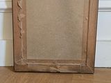 a picture of an empty picture frame on the floor