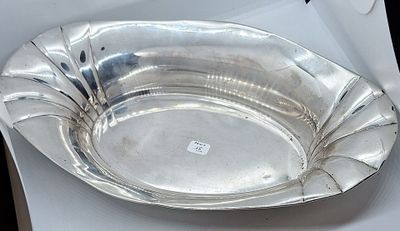 a silver plate that is sitting on a table