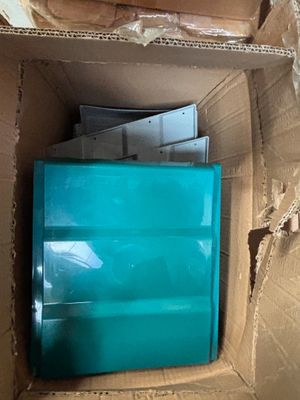 a box full of boxes with a blue box inside of it