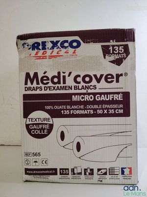une boîte « Medi' Cover » posée sur une surface blanche