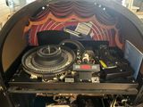 a large machine that is sitting inside of a room