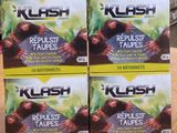quatre boîtes de « Kush Repoliste Taupes » sont posées sur une table