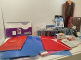a lot of supplies on the counter in the room
