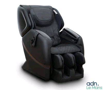 the massage chair is black and has a brown stripe on it