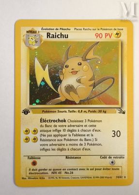 a close up of a pokemon card on a white surface