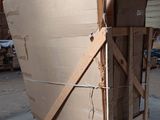 a large cardboard box sitting on top of a pallet in a warehouse