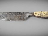 a knife that is sitting on top of a table