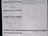 a picture of a document with a picture of a security badge on it