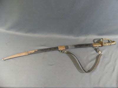 a knife that is laying on a white cloth