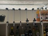 many bottles of alcohol on the shelves in the store
