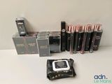 many different types of electronic devices on the table