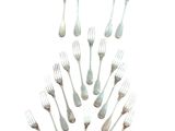 a lot of forks and spoons arranged in a circle