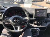 dashboard of a car with a steering wheel and dashboard controls