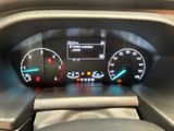 the dashboard of a car with a speedometer, gauges, and other instruments