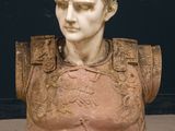 a bust of a man in armor on a pedestal
