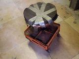 a small table with a piece of paper on top of it
