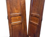 two wooden doors with one open and the other closed