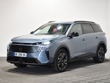 a grey 2021 hyundai kona suv parked in a white room