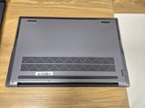 a laptop that is sitting on a table with a keyboard