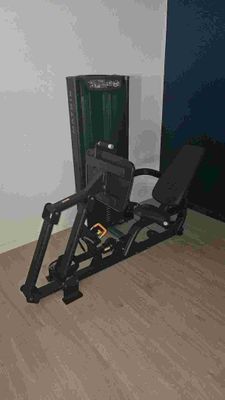 an image of a home gym equipment set up in the corner of a room
