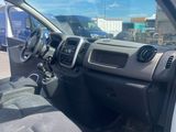 the interior of a white truck with a steering wheel and dashboard