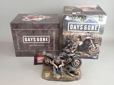 a figurine of a man on a motorcycle with a box behind it