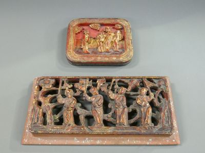 two decorative items on display on a table