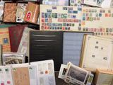 many different types of stamps on a table
