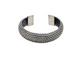 a close up of a metal bracelet with a chain on it