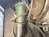 an image of a dirty kitchen sink with a lot of clutter on it