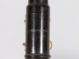 a close up view of a black pipe with a white background