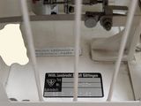 a picture of a jail cell with a sign on it