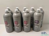six bottles of l ' oreal lotion sitting on a table