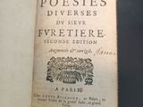 an open book with a picture of a bird on it
