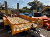 an image of a trailer with a wooden deck