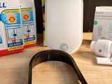 a toilet that is sitting on a table next to a box of toilet paper