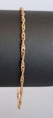 Bracelet en or jaune 14K 585 millièmes, à mailles torsadées. - Photo 1