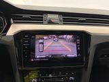 the interior of a car with a camera mounted on the dashboard