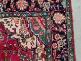 rug on the floor with a cat laying on it ' s side